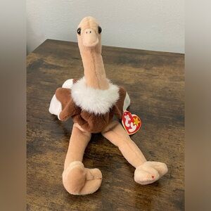 Ty Beanie Baby * Stretch the Ostrich * Date of‎ birth: September 21, 1997 *